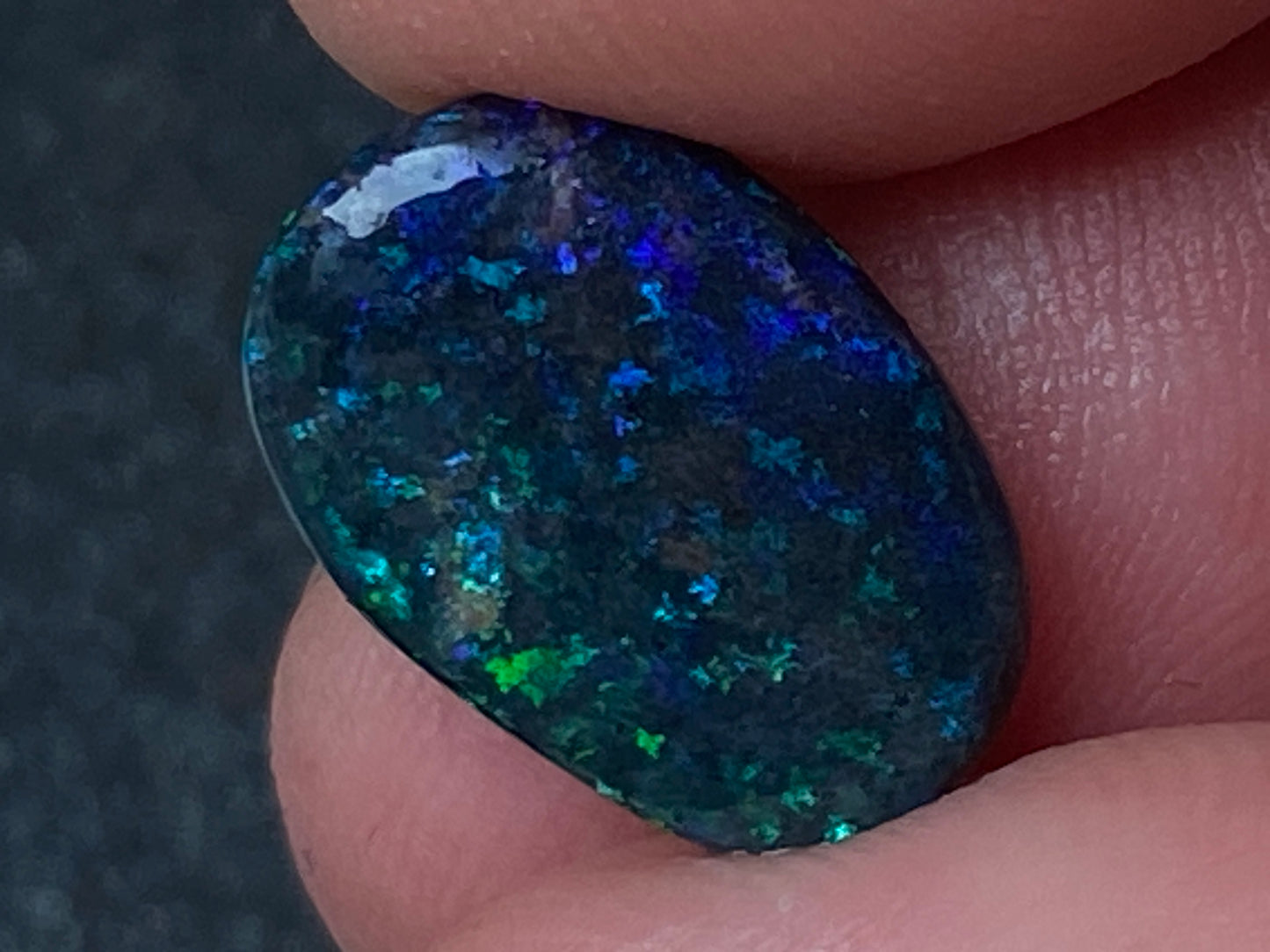 3.8 Carats, Andamooka Matrix Treated Solid Black Opal, 14x10 Oval, Polished, Bright Greens and Blues