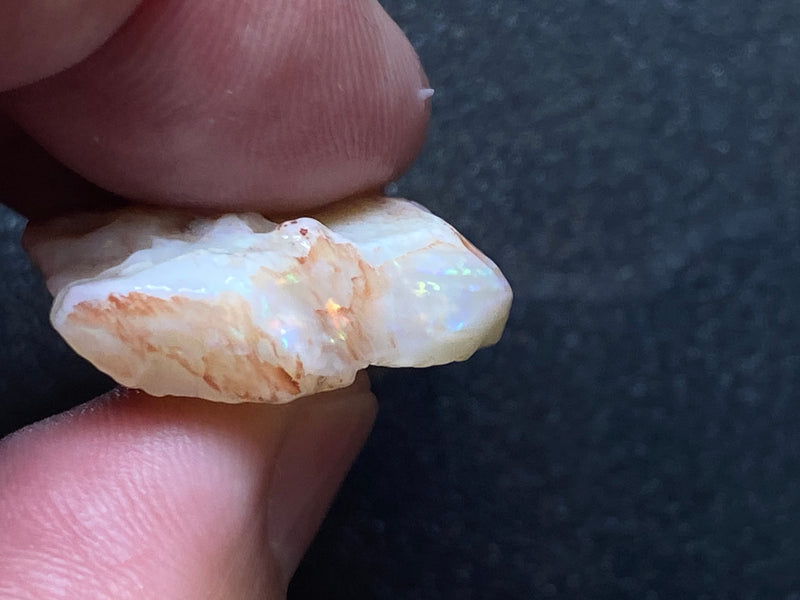34Cts Natural Australian Opal Stone, Coober Pedy In The Rough, White, Greens, Blues and Reds.