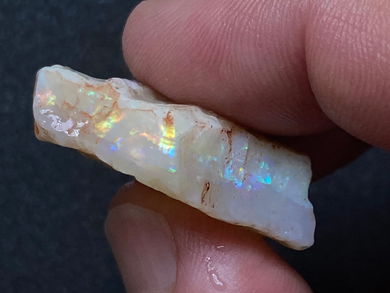 34Cts Natural Australian Opal Stone, Coober Pedy In The Rough, White, Greens, Blues and Reds.