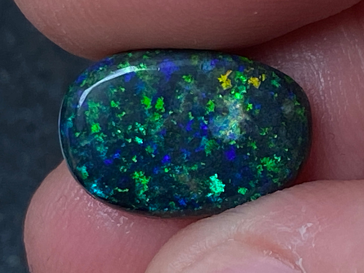 3.8 Carats, Andamooka Matrix Treated Solid Black Opal, 14x10 Oval, Polished, Bright Greens and Blues