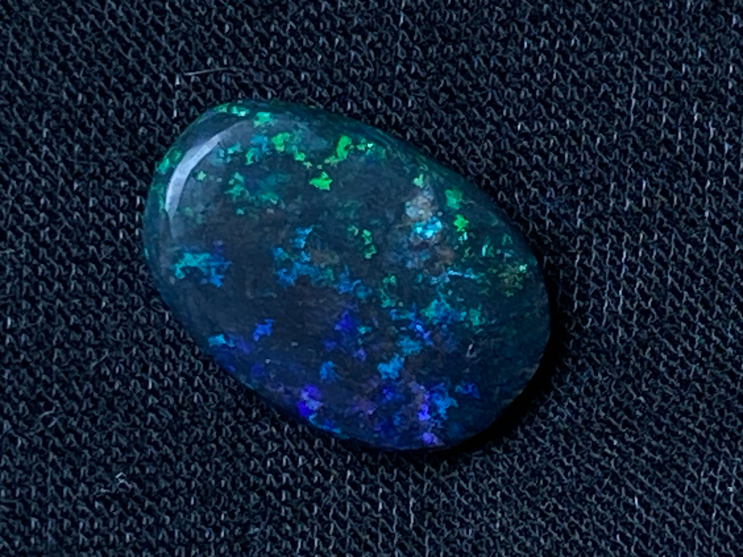 3.8 Carats, Andamooka Matrix Treated Solid Black Opal, 14x10 Oval, Polished, Bright Greens and Blues