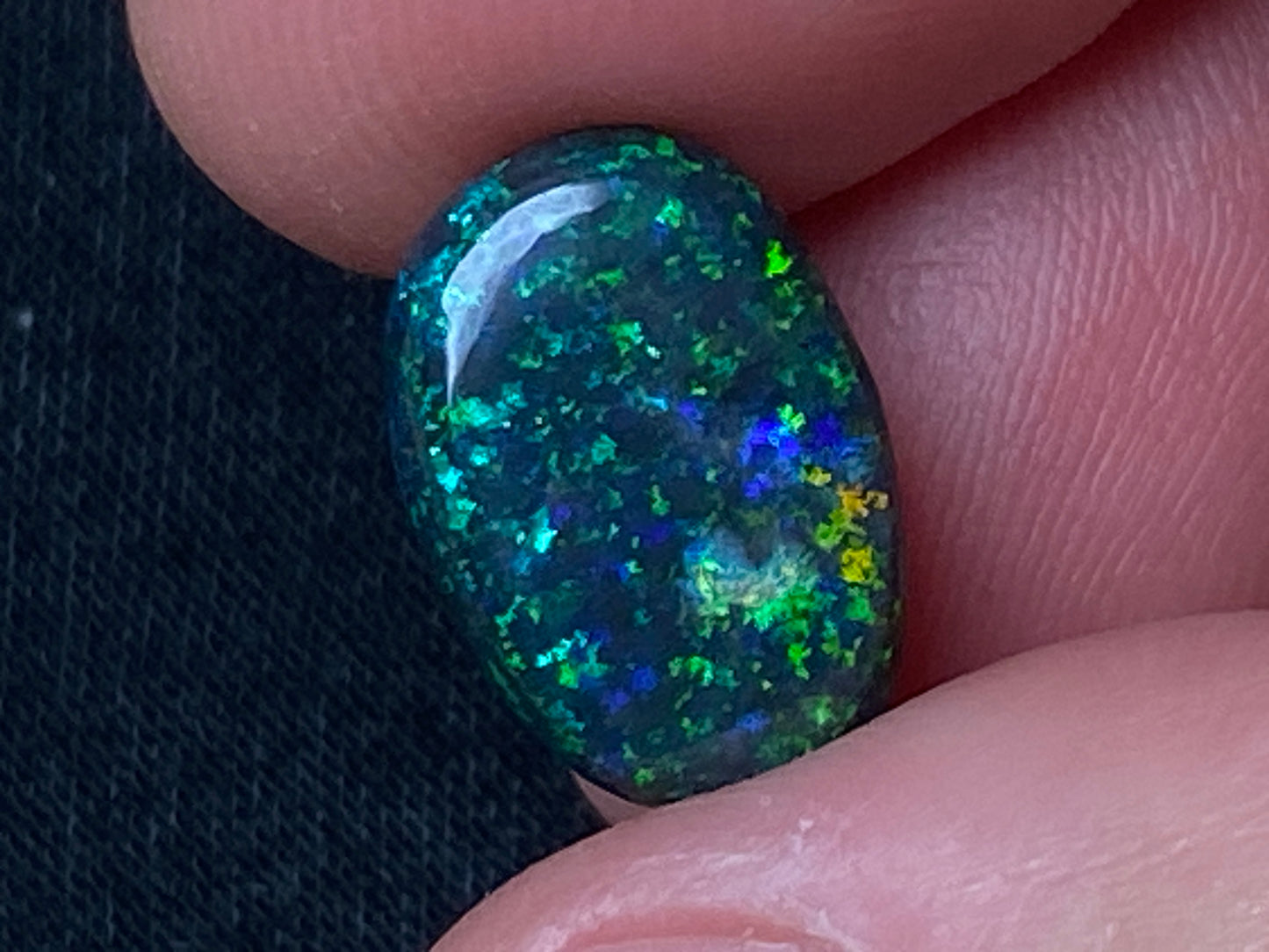 3.8 Carats, Andamooka Matrix Treated Solid Black Opal, 14x10 Oval, Polished, Bright Greens and Blues