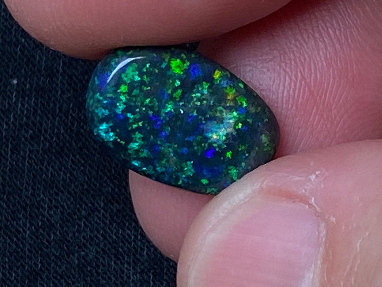 3.8 Carats, Andamooka Matrix Treated Solid Black Opal, 14x10 Oval, Polished, Bright Greens and Blues