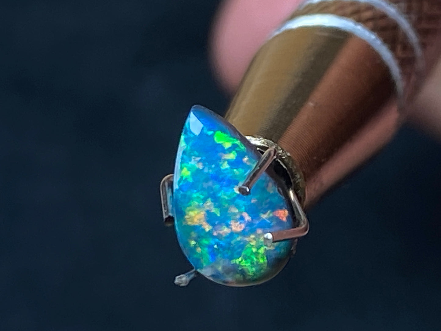 0.72Cts Black Mintabi Tear Drop Polished Stone, Brilliant Pin Fire Rainbow Of Color, Gem quality