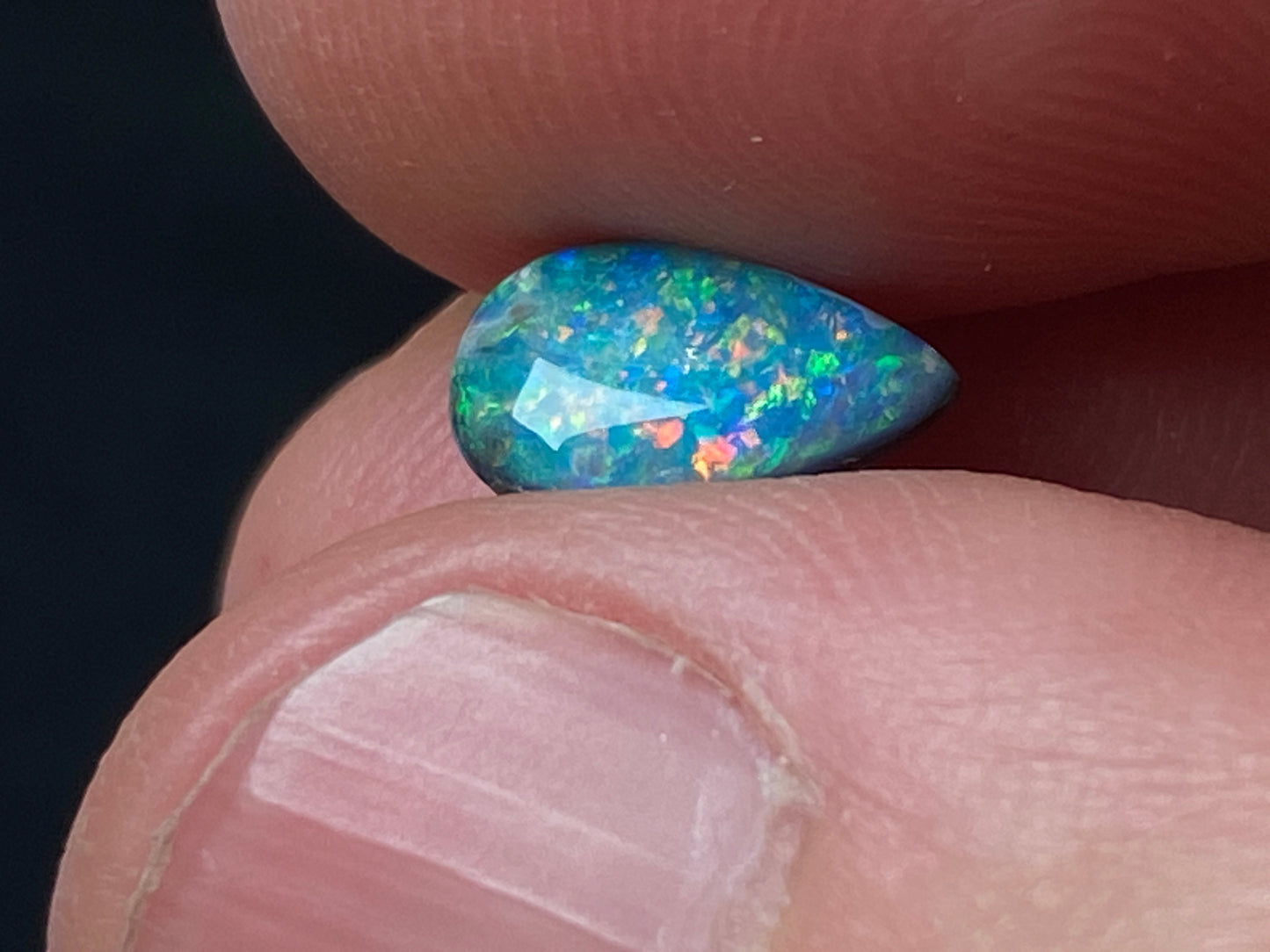 0.72Cts Black Mintabi Tear Drop Polished Stone, Brilliant Pin Fire Rainbow Of Color, Gem quality