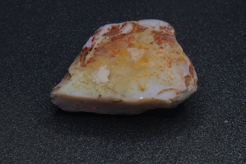 0.5OZ, 75Cts Coober Pedy Brilliant Opal Stone, Shaped In The Rough. King Stone From The Opal Hunters Episode 1. Vivid Reds, Blues And Greens. - Australian Opal Store