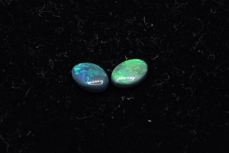 0.75Cts Two Beautiful Lightning Ridge Black Polished Opals. Greens and Blues. - Australian Opal Store