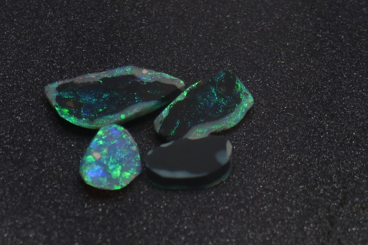 6.3Cts Lightning Ridge Black Opal Rubs Parcel, 4 Stones, Bright Greens And Blues. - Australian Opal Store